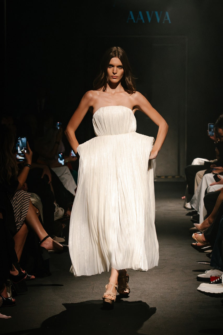 Strapless gown pleated fabric soft and flowing look.