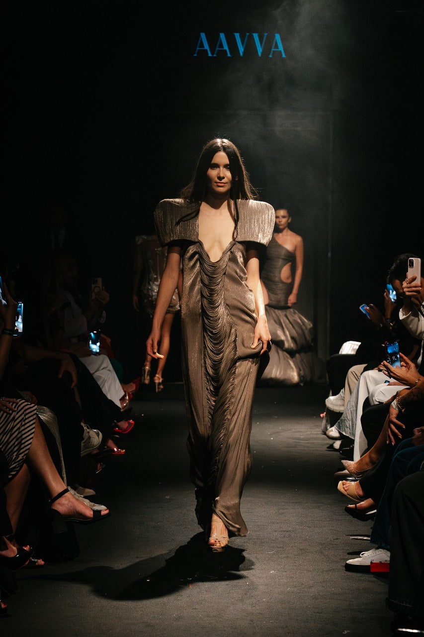 Sculpted bodice with padded shoulders