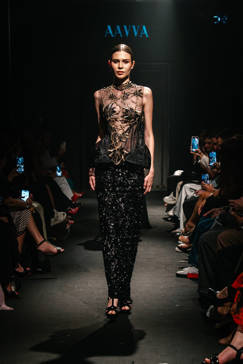 Sheer black top with a high neckline