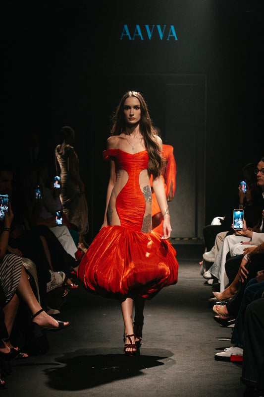 Striking Red Gown with an off-the-shoulder and a sleek