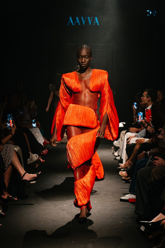 Gown Embelished with Pleats and Dramatic Silhouette