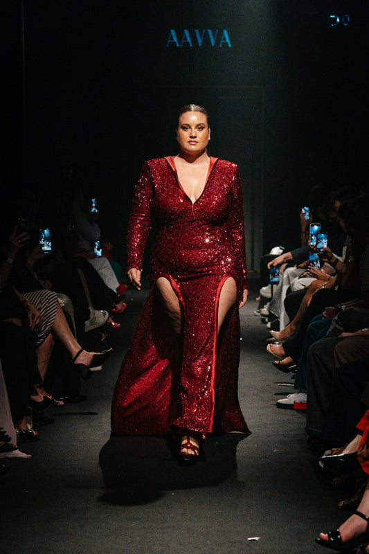 Plunging Neckline adds allure, while Two High front slits