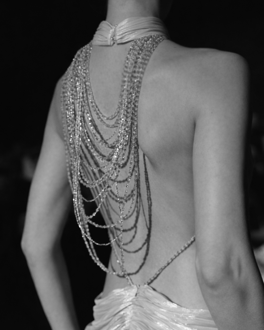 High neck finely pleated fabric