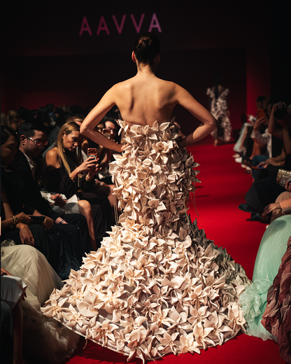 Strapless mermaid gown embellished with fully 3D flowers with fringes