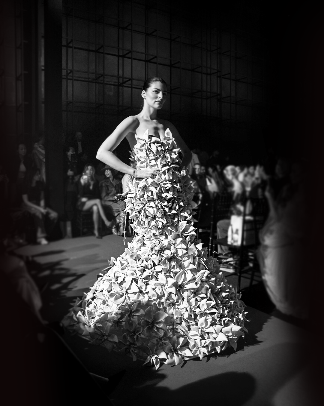 Strapless mermaid gown embellished with fully 3D flowers with fringes