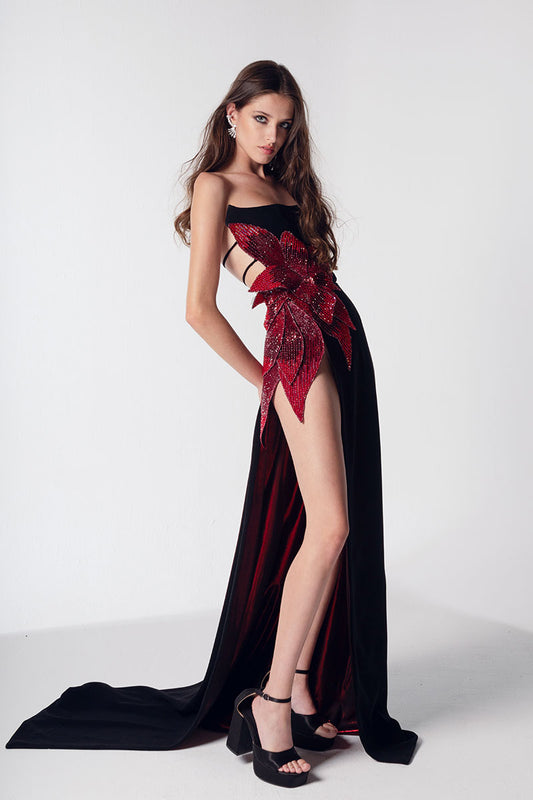 Black crepe dress with embroidered flower on the side waist  with metallic red lining