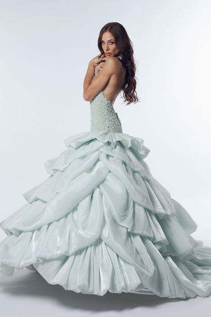 A halter neckline mint green ball gown