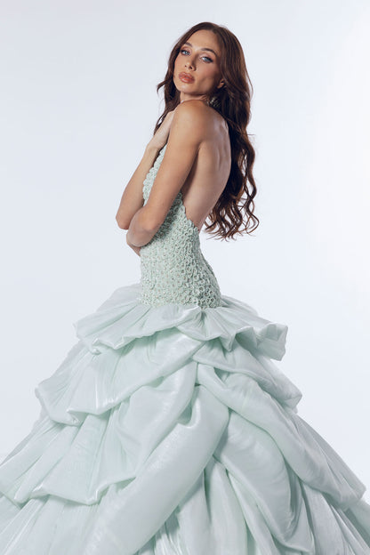 A halter neckline mint green ball gown